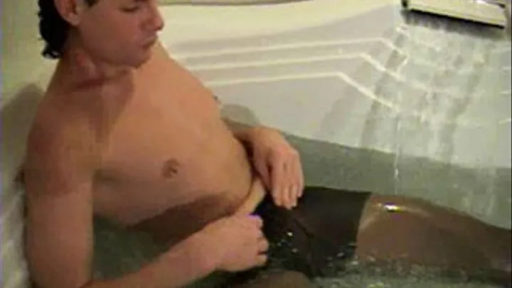 Man in Black Pantyhose in the Jacuzzi