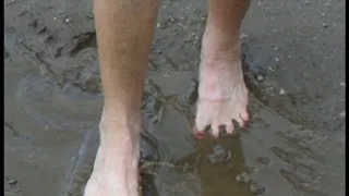 Bare feet in Mud