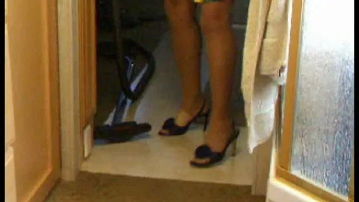 Vacuuming in Blue Mules and Pantyhose