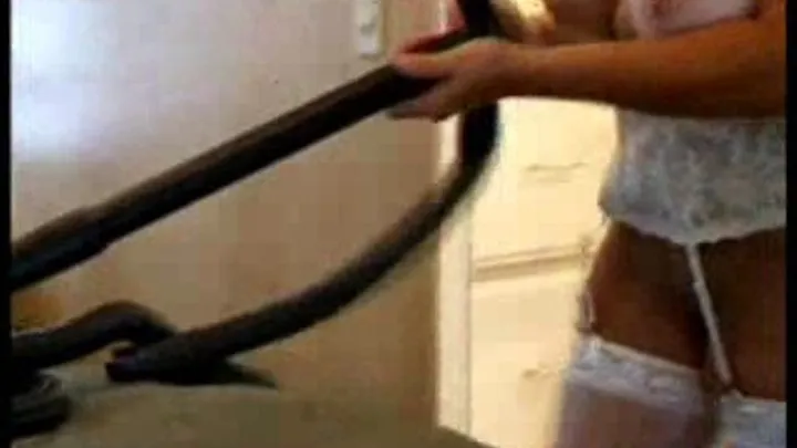 Topless MILF Vacuuming in Layered Stockings