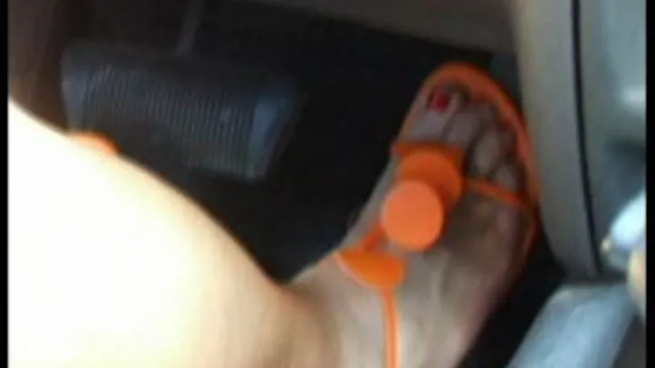 Pedal Pumping in Orange Stiletto Sandals