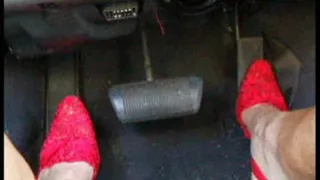 Pedal Pumping in Red Lace Stilettos