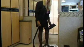 Vacuuming in Black Suit/Stockings