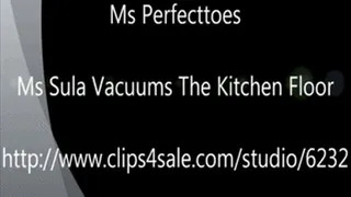 Ms Sula Vacuums The Kitchen Floor