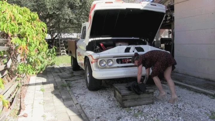 Fayth Stuck Under a Truck Hood