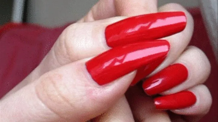 Red long natural nails..