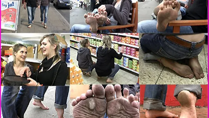Two Barefoot Friends in Jeans with Dirty Feet