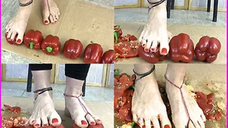 Tall Natasha crushes red Peppers with her large Bare Feet