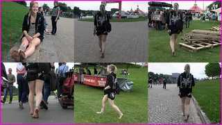 Barefoot Punk Girl Bronco walks across a Festival