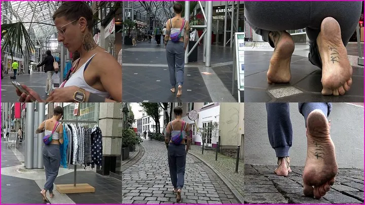 Jana walks Barefoot in the City with light-blue polished Toes