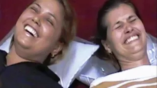 Raquel and Leticia in foot face tickling closeup