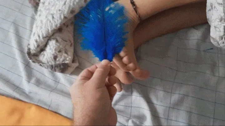 Alessandra in blue feather soles tickling closeup