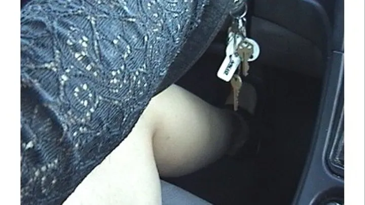 Driving in Black Shorts: Trina