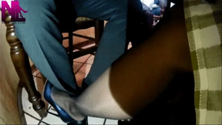 Footsie under the table in black sheerest pantyhose and blue Buffalo pumps