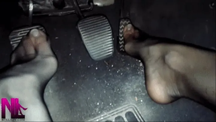 Toeless black pantyhose on my car's pedals in a speedy ride