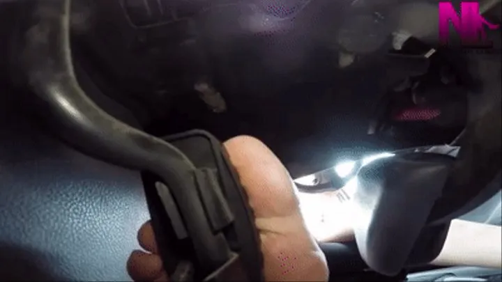 Sexy car driving and pedal pumping with my bare soles under the pedals view