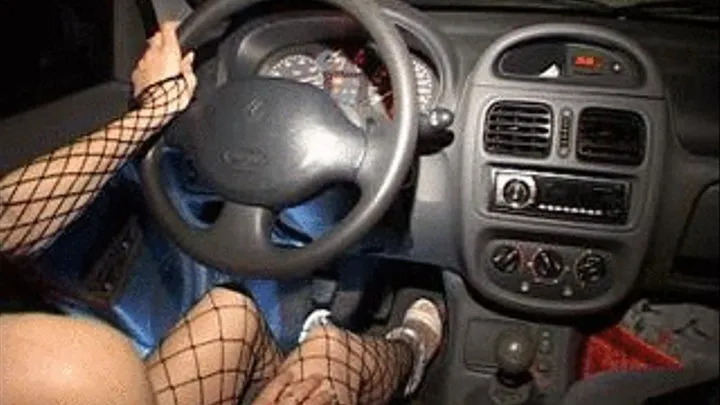 Lounise driving with white heel