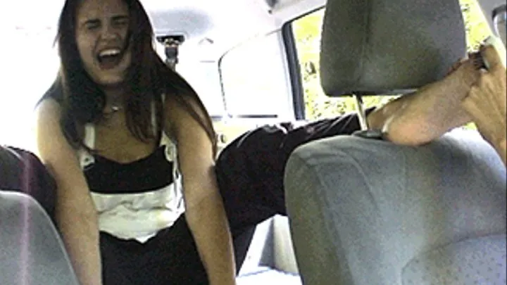 Louise is tickled silly in the car 03