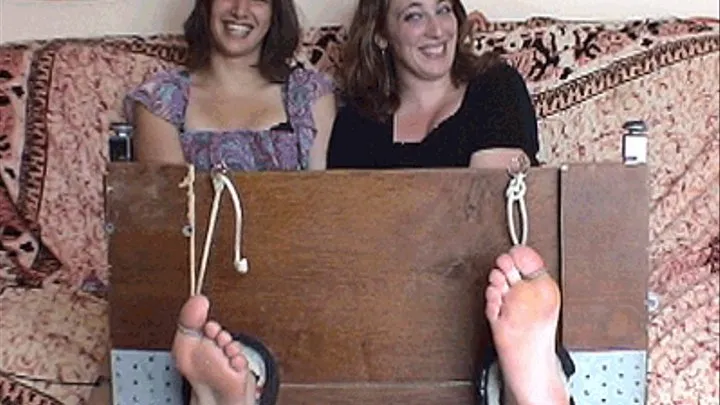 Ophelia & Ludmila are Tickled Together in the Stocks