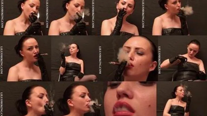 Leather Girl smoking - - Video is 6:30 min