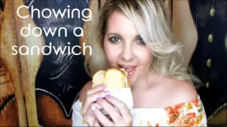 Chowing down a sandwich