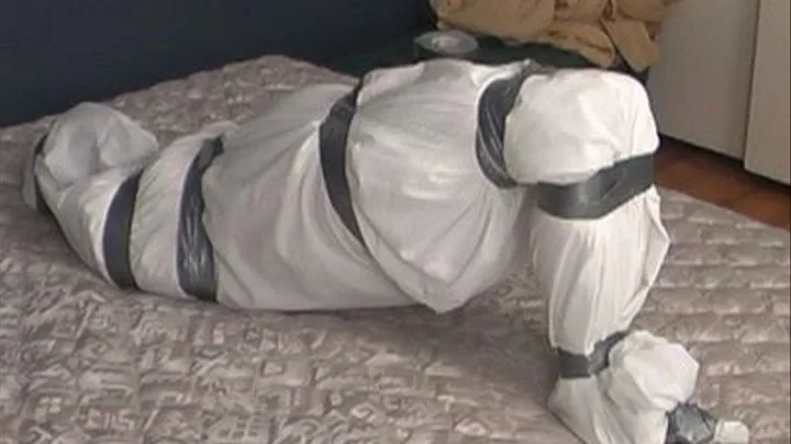 Julie taped in sheet