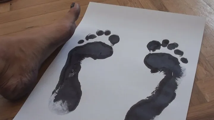 Huanita's foot prints and flip flops