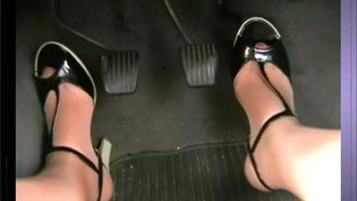 Driving in Strappy Black Sandals