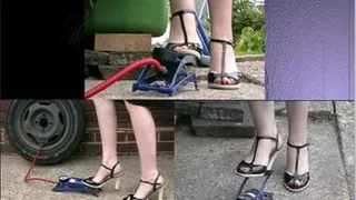 Tyre Foot Pumping in Strappy Black Heeled Sandals