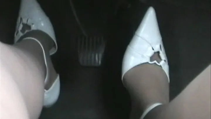 Driving in White Ankle Strap Heels