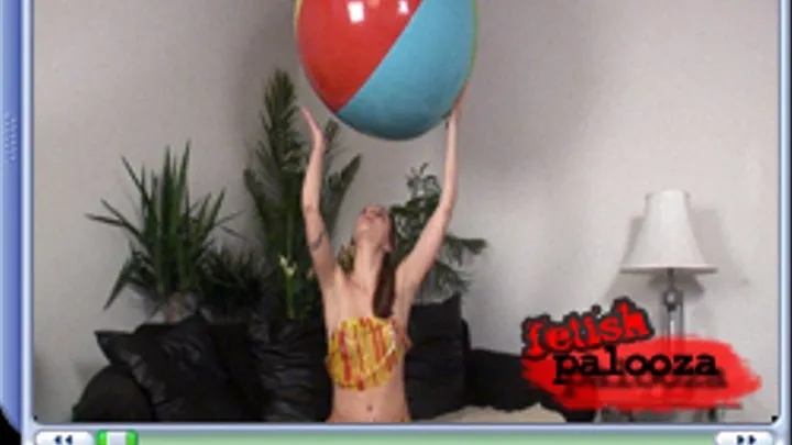 Beach ball loving girl