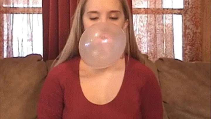 Blowing and Snapping Her Gum