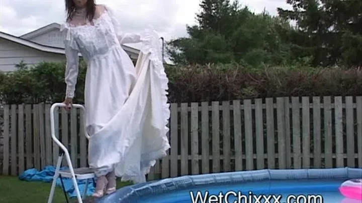 Wedding Gown in the Pool on a Cold Day