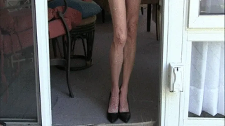 Lilly in the doorway, posing her granny legs