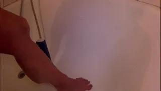 Iron Ivy, shaving her legs in the shower