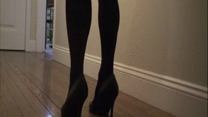 Lilly in the hall, the black tights, the black stilettos