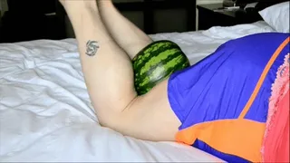 Christal Bentley with a watermelon between her mancrushers