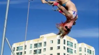 Amazing acrobatics and feats of strength by Liz Lightspeed at the beach!