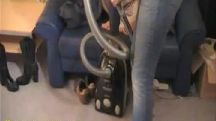 Leyla barefoot vacuuming