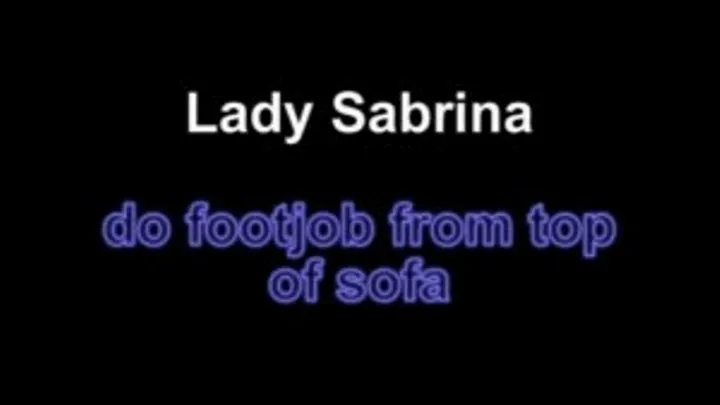 Lady Sabrina do footjob from top of sofa