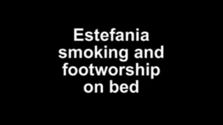 Estefania smokimg and footworship on bed