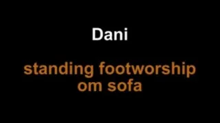 Dani standing footworship on sofa