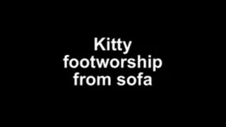 Kitty footworship from sofa