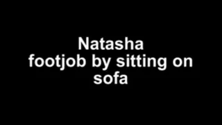 Natasha footjob by sitting on a sofa