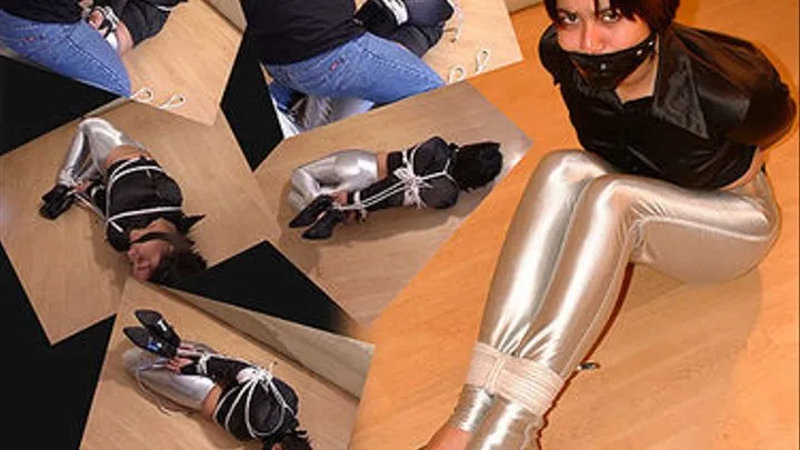 Rashir hogtied on-screen in silver Spandex Disco Jeans