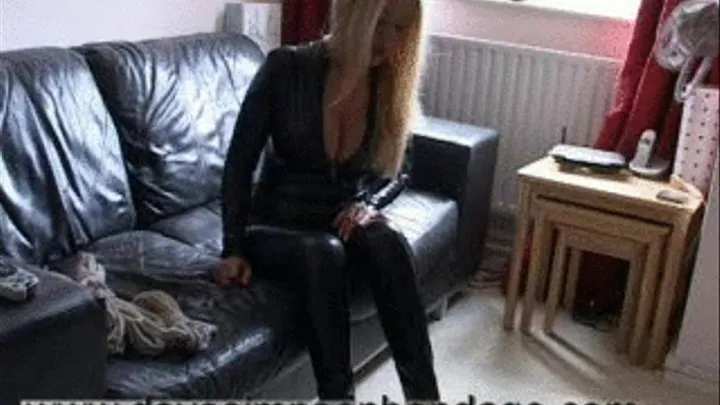 Taylor Morgan, bound in pvc catsuit