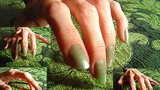 Light green fingernails tapping/drumming on surface