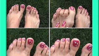 Gina shows off pretty polished toes with decals