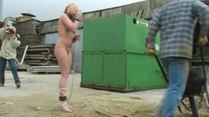 Female nude slave worker, outdoor industrial, chains and cuffs, CMNF, Lindsay Wheatcroft