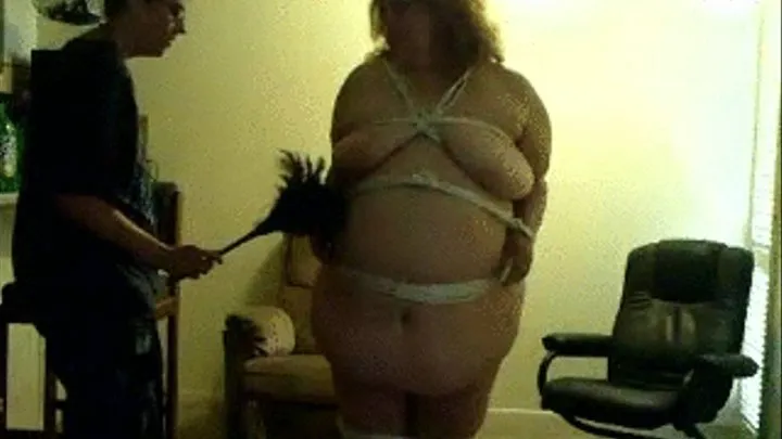 BBW gets tickled with a feather doster while tied up!